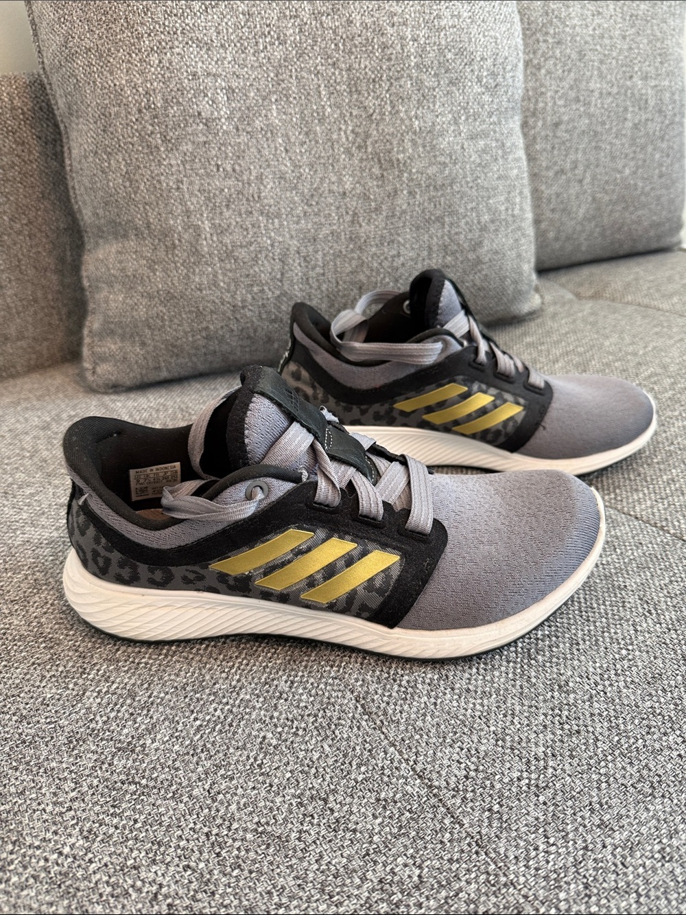 adidas Women’s Grey Athletic Shoes with Gold Stripes